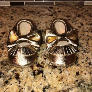 Baby gold moccasins size 2-3